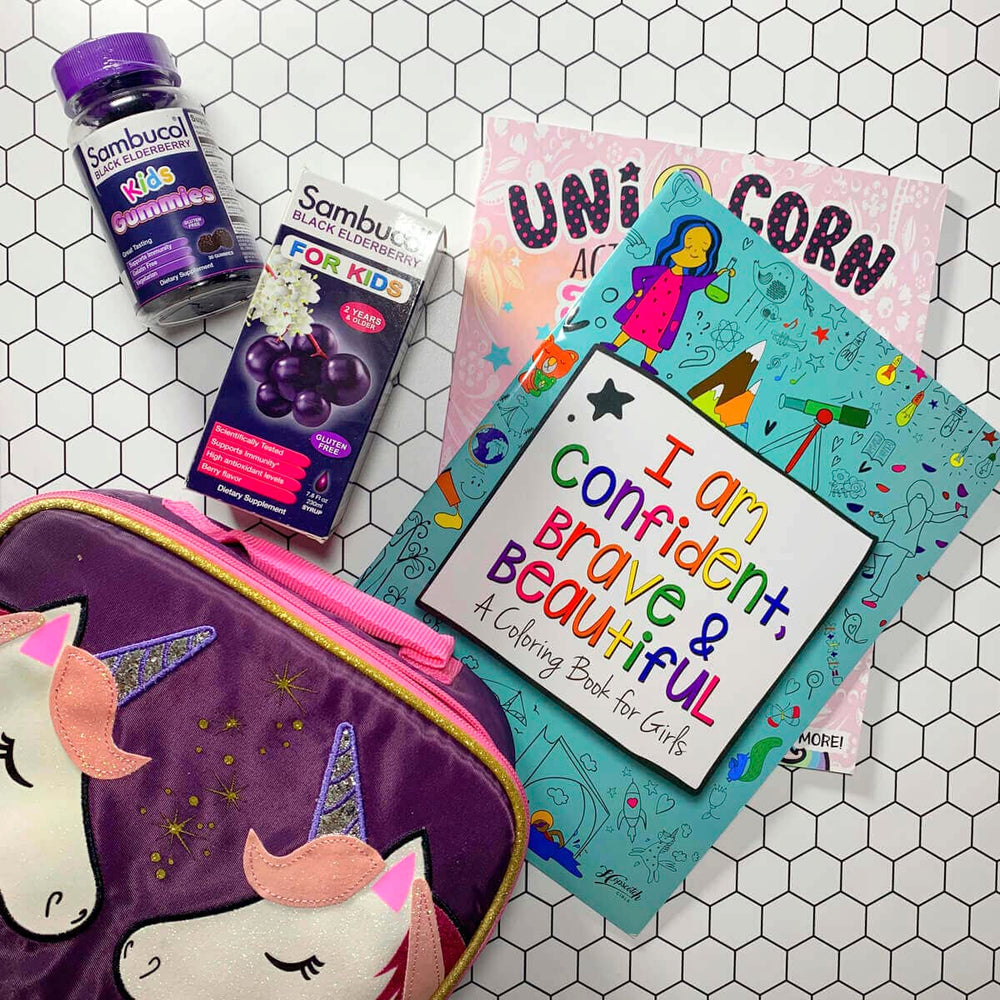 Sambucol Black Elderberry Syrup for Kids bottle on a table