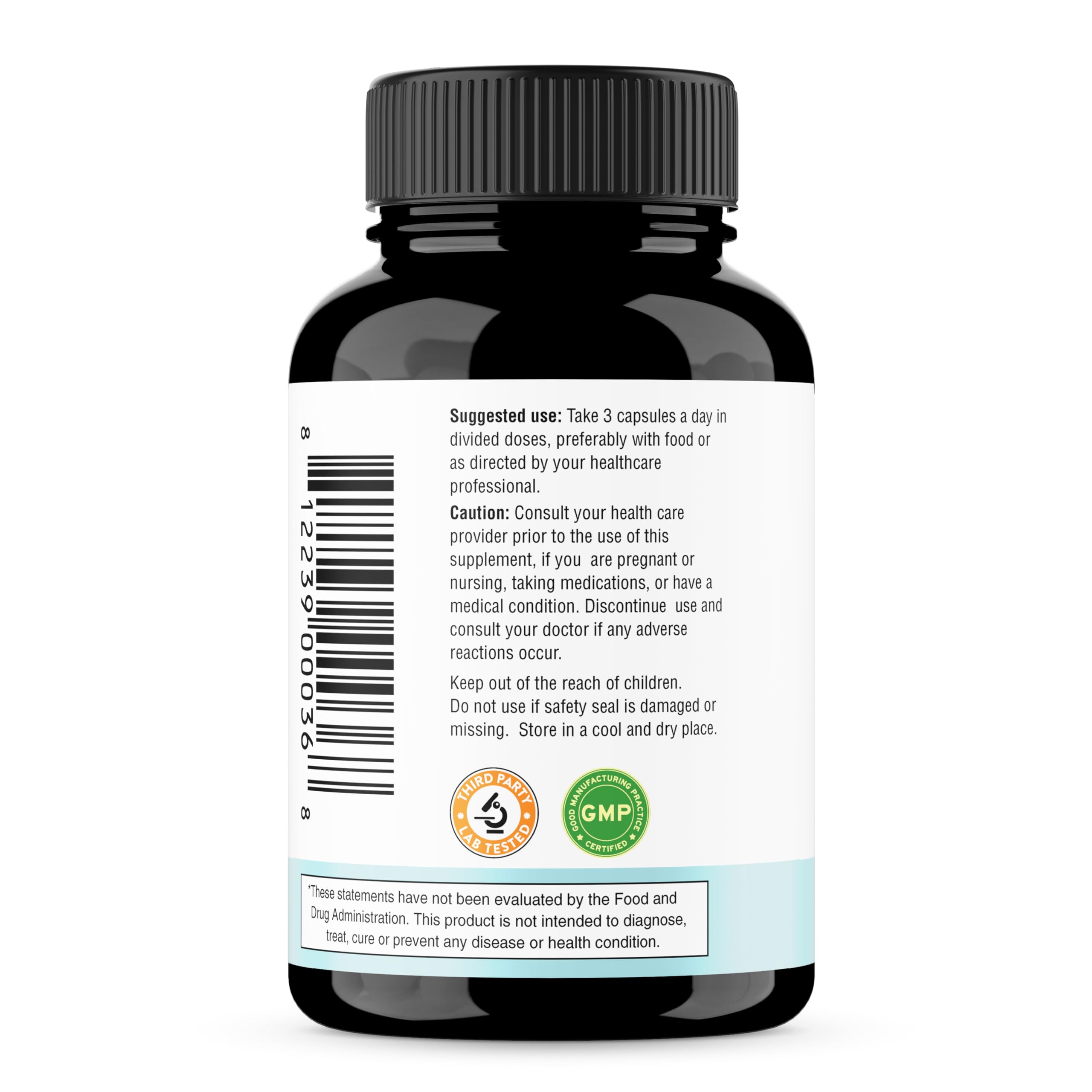 Three capsules next to a measuring spoon