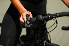 Science in Sport Beta Fuel orange chews in use supports cycling and running fuel during workouts.