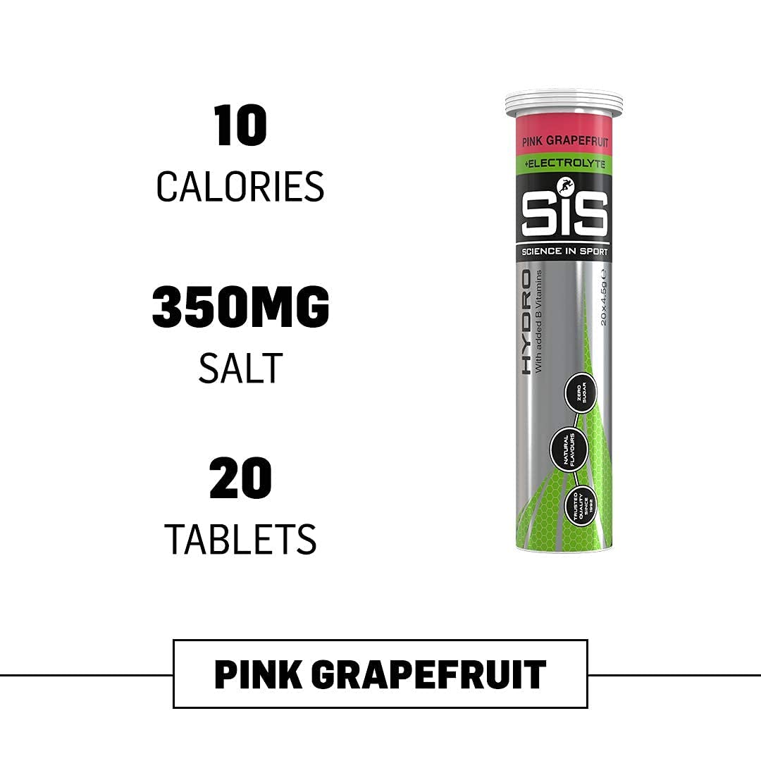 Hydro Electrolyte tablets pink grapefruit dissolving in a glass of water