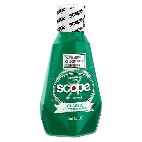 Close-up of Scope Mouthwash Classic Original Mint travel-size bottles (1.2 oz) in packaging