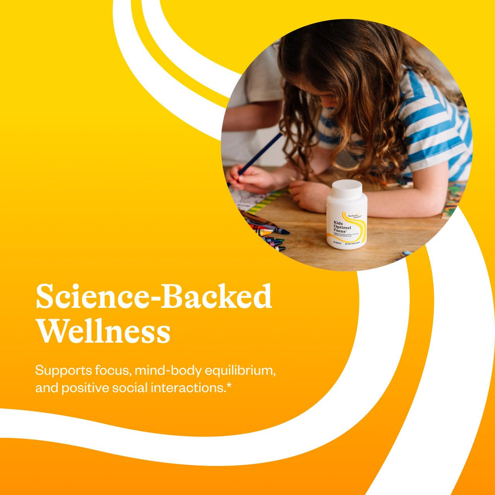 Chewable tablets arranged for kids near a glass of water