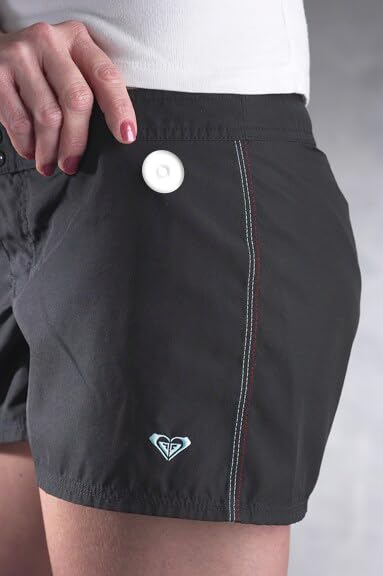 Kit contents showing two magnets and ten adhesive discs