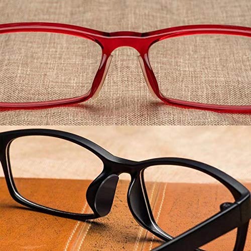 Eyeglasses with clear silicone adhesive nose pads applied