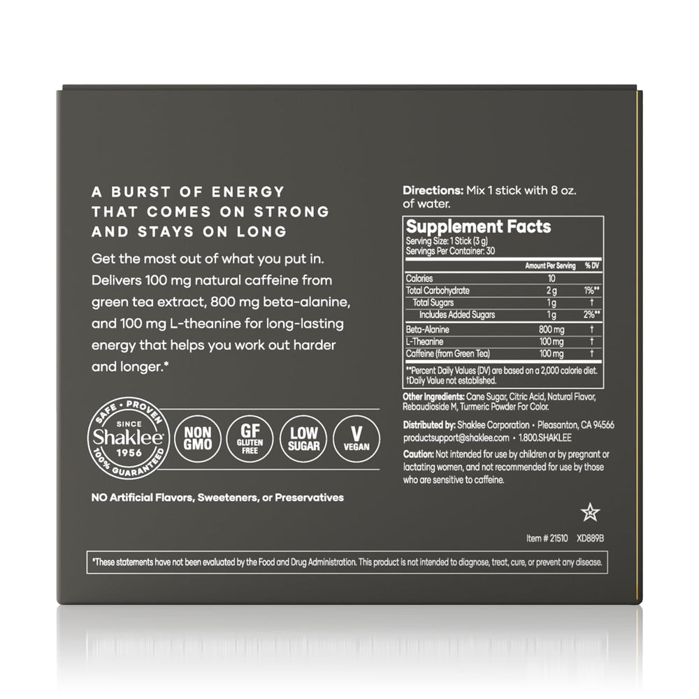 Shaklee green-tea lemon drink poured in a glass highlights refreshing flavor and focus.