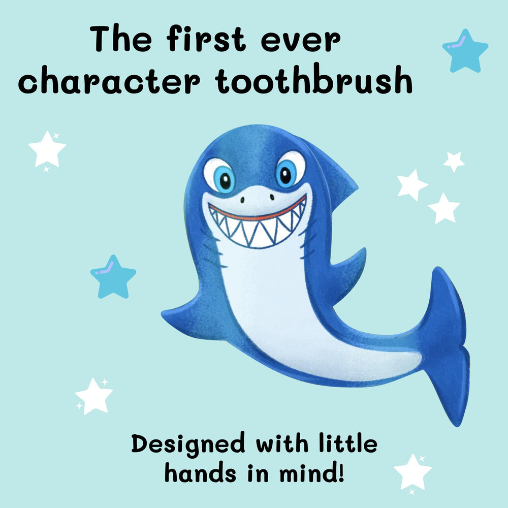 Shark toy in use with a toothbrush