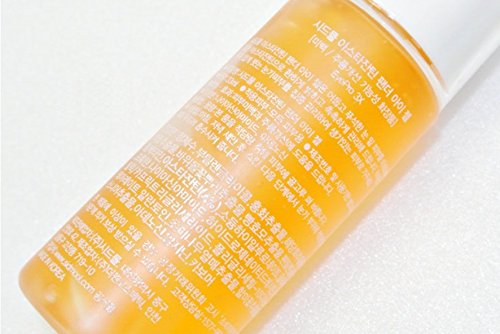 Skincare setup featuring toner and ASTAXANTHIN essence