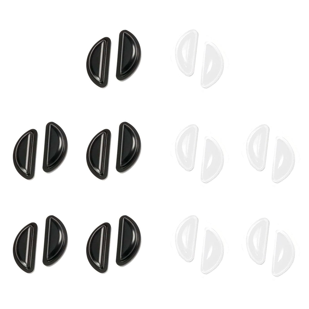 Silicone eyeglass nose pads attached to a frame in black and clear colors