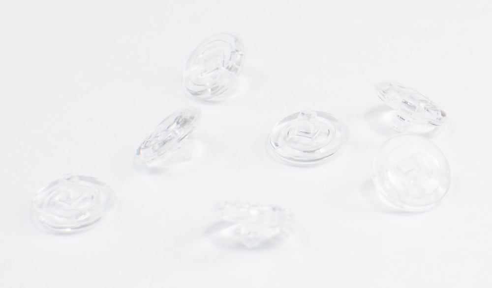 Close-up of round silicone nose pads for eyeglasses, 9mm screw-fit
