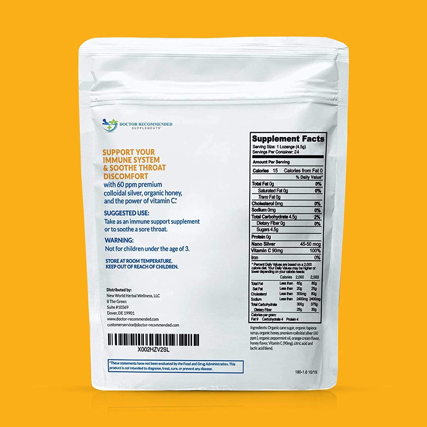 Close-up showing orange-flavored lozenge and ingredients