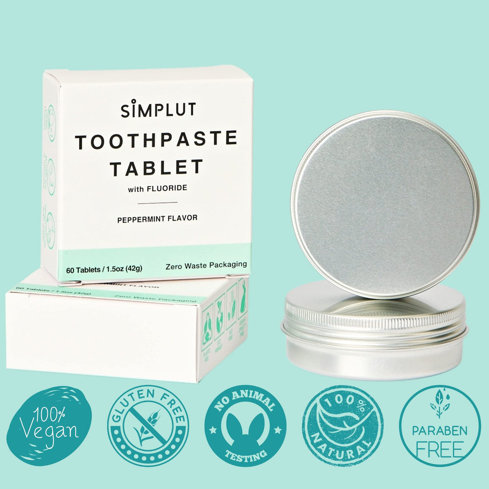 Close-up of SIMPLUT toothpaste tablets in foil packaging