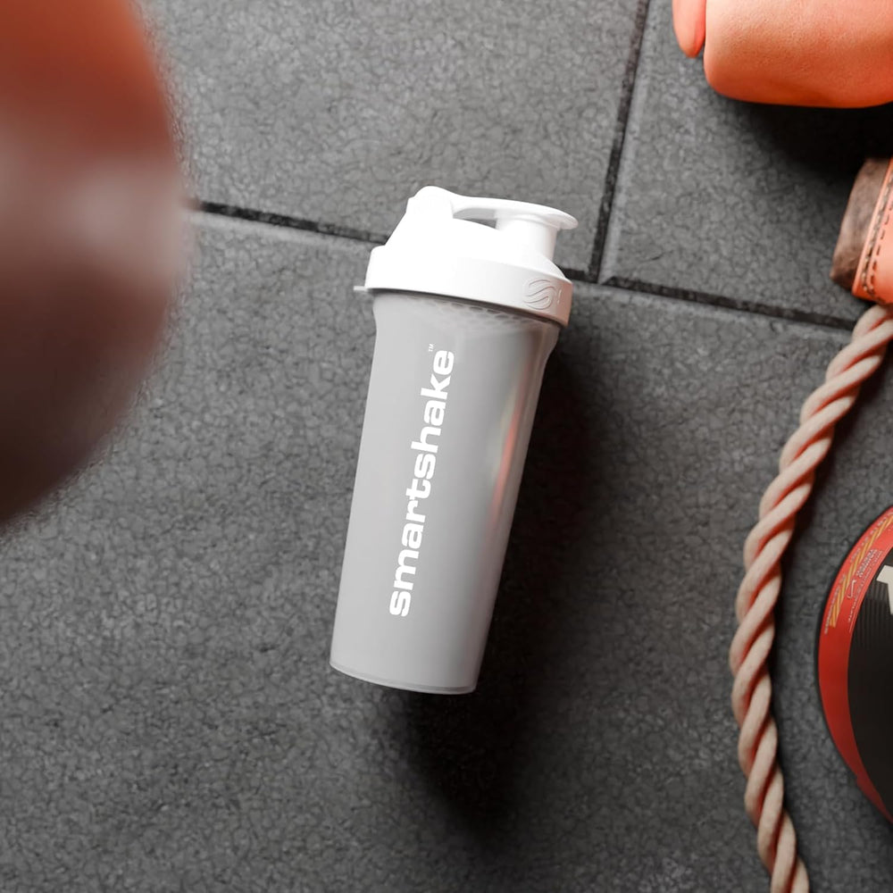 Shaker bottle in gym bag for on-the-go protein shakes