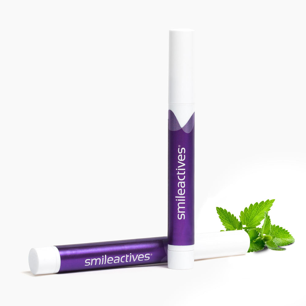Close-up of precision brush-tip whitening gel pen