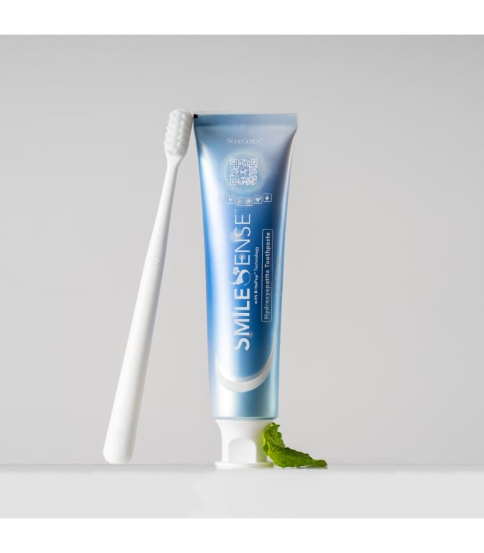 SmileSense toothpaste tube next to enamel and sparkles