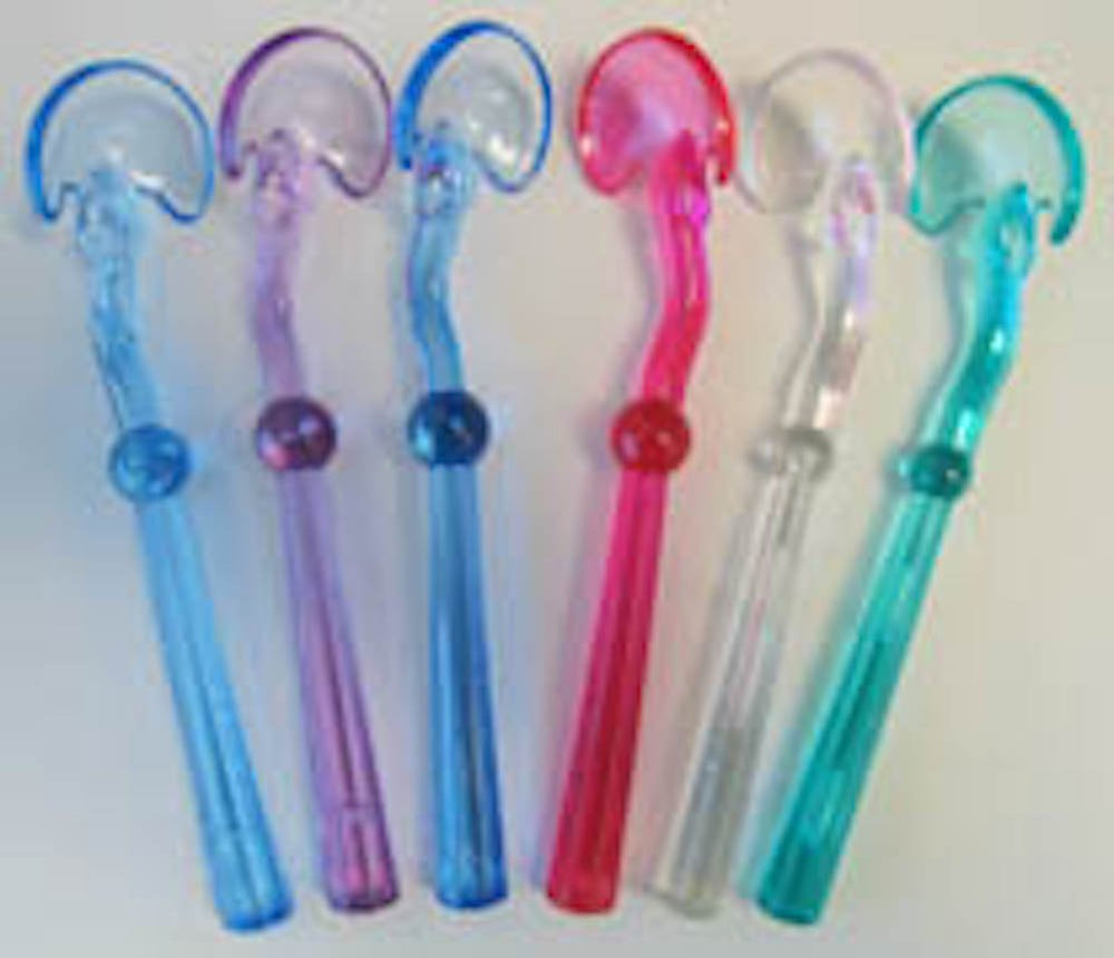 SoFresh Tongue Scraper in use on tongue