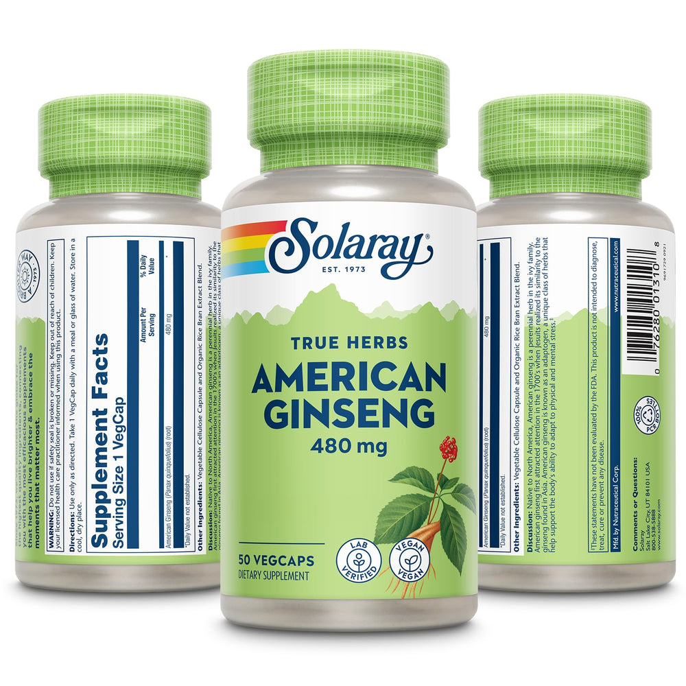 Close-up of ginseng capsules and product bottle