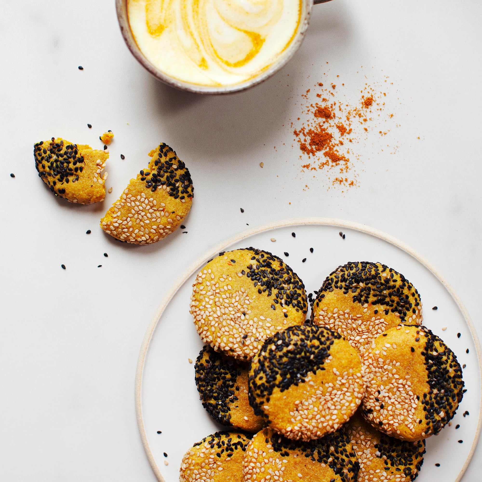 Ingredients include turmeric, ginger, cinnamon, black pepper, cardamom and tulsi