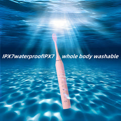 Travel friendly pink sonic toothbrush in a bag