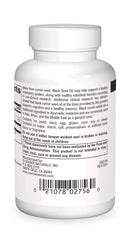 Close-up of black seed oil softgels