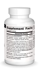 Close-up of a cherry-flavored B-12 lozenge