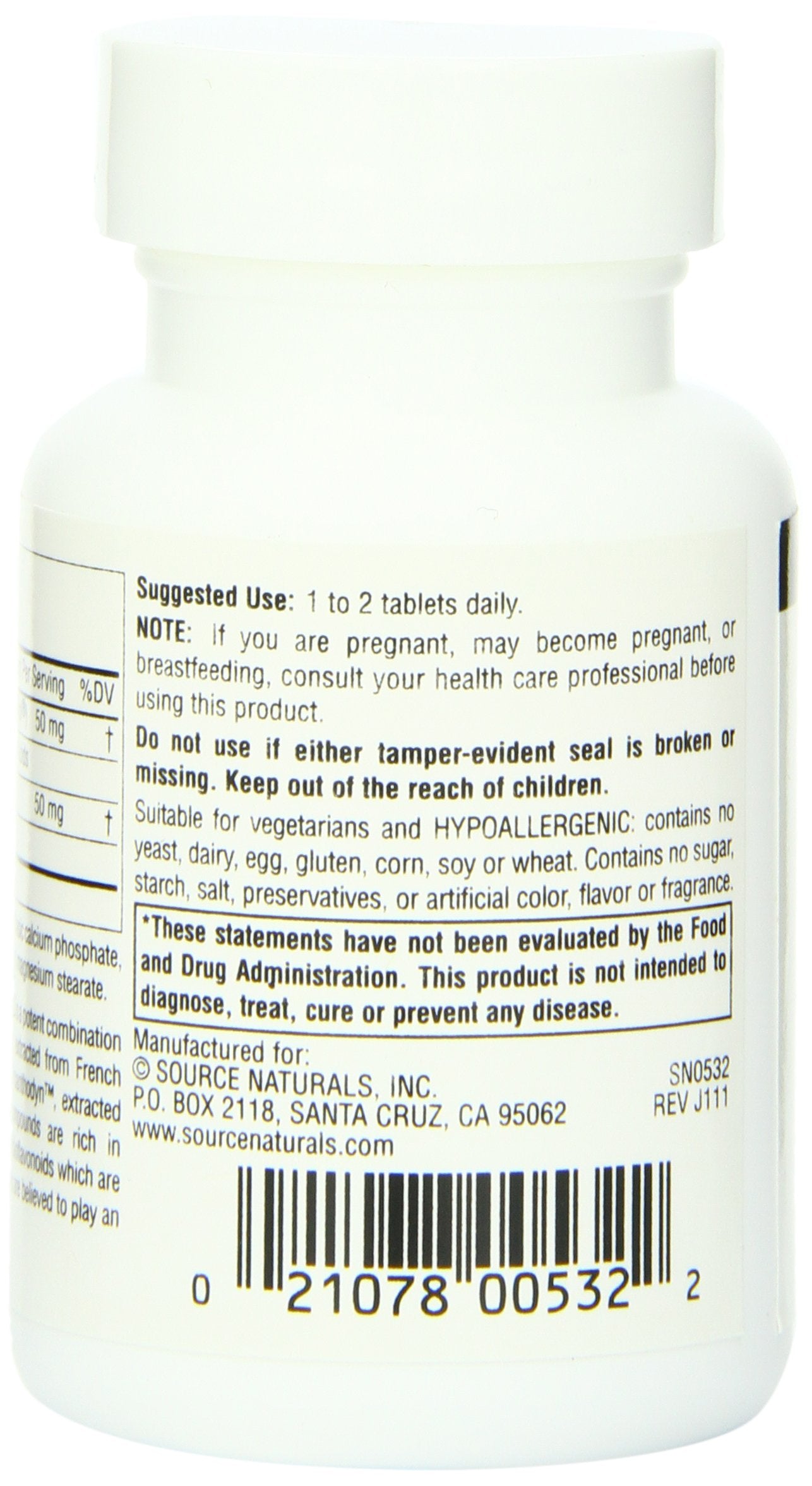 Open bottle with tablets inside
