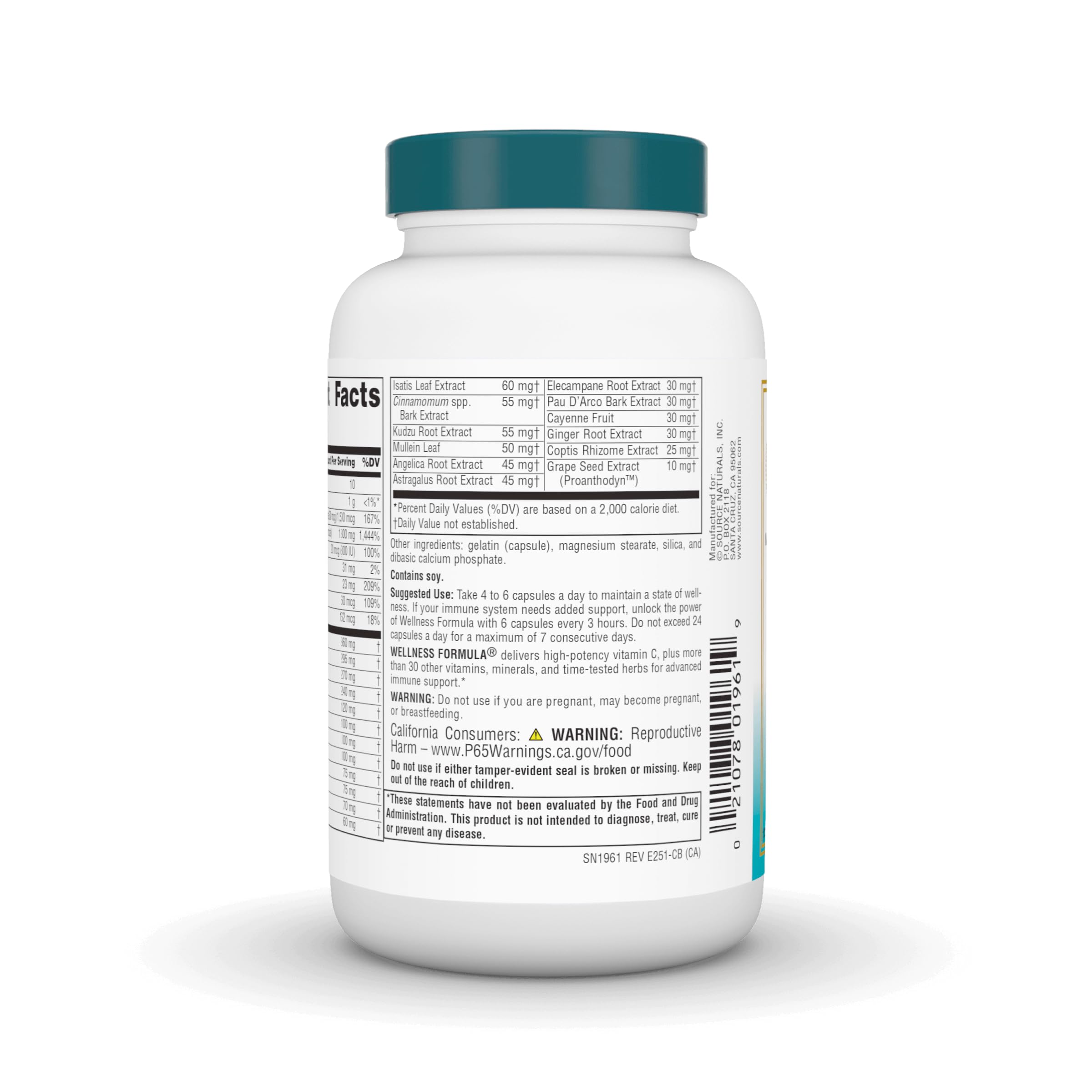 Source Naturals Wellness Formula capsules close-up with vitamin and herb blend.