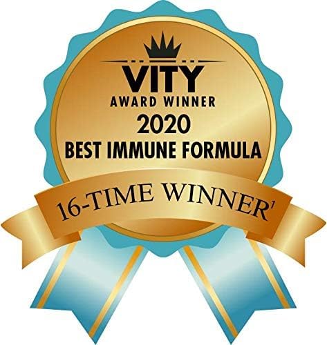 Source Naturals Wellness Formula capsules poured into hand for daily routine.