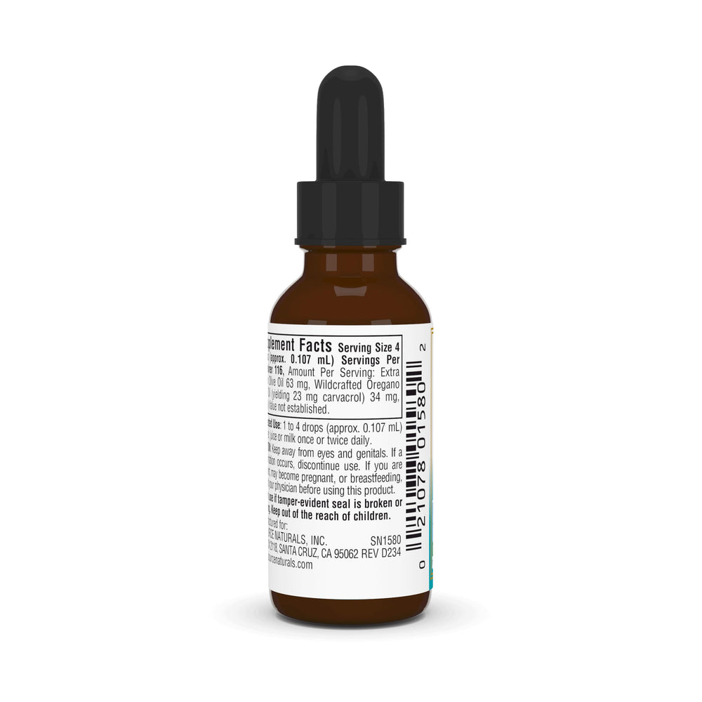 Oregano oil drops dispensed from a dropper