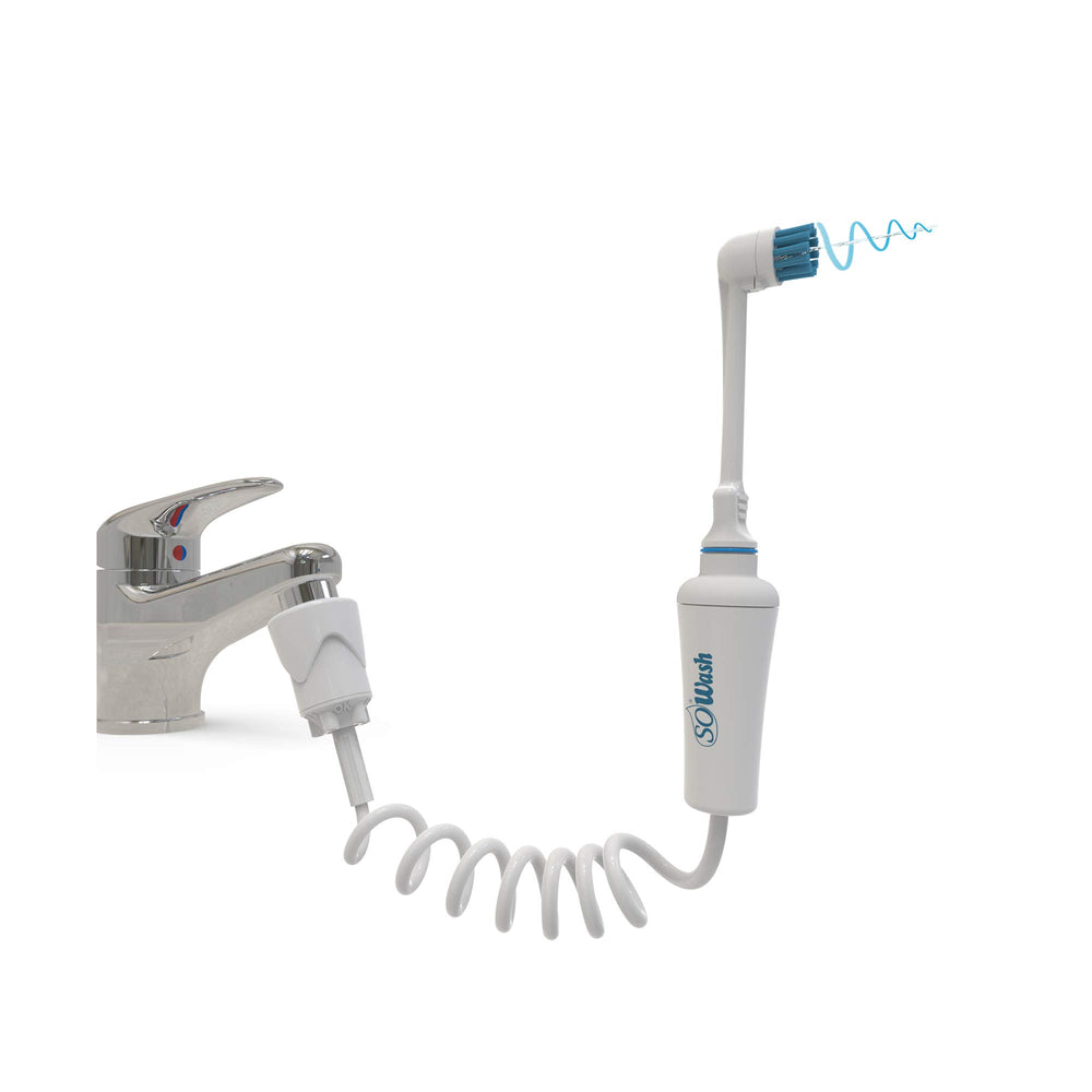 SoWash Vortice Brush Water Flosser connected to faucet with integrated bristles for brushing and flossing