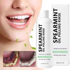 Close-up of product label for spearmint oil pulling mouthwash