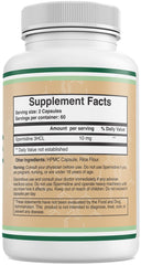 Spermidine capsules and bottle displayed on a white surface