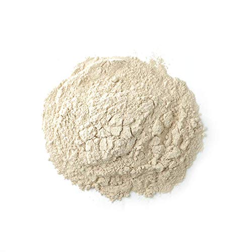 Powdered shiitake mushrooms in a white bowl
