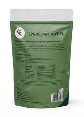 Close-up of spirulina powder in a scoop with label