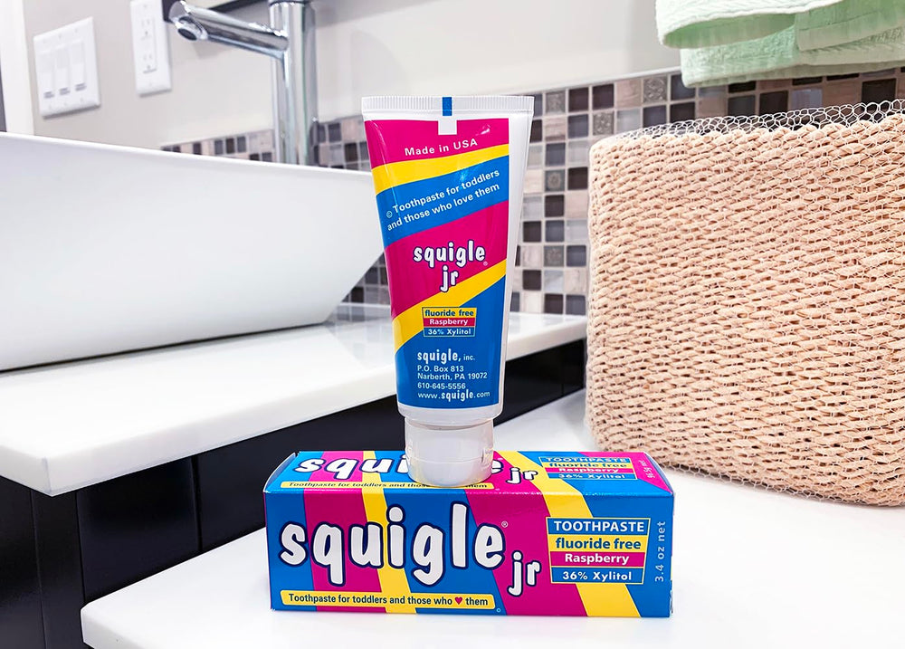 Baby-friendly toothpaste use and safety features of Squigle Jr