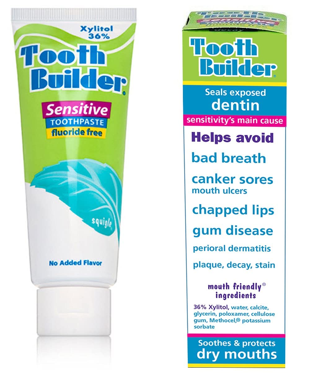 Toothpaste being applied to a toothbrush—enamel-safe, non-abrasive formula