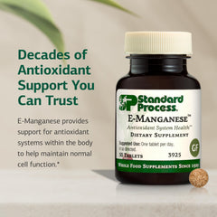 E-Manganese tablets in bottle on white background