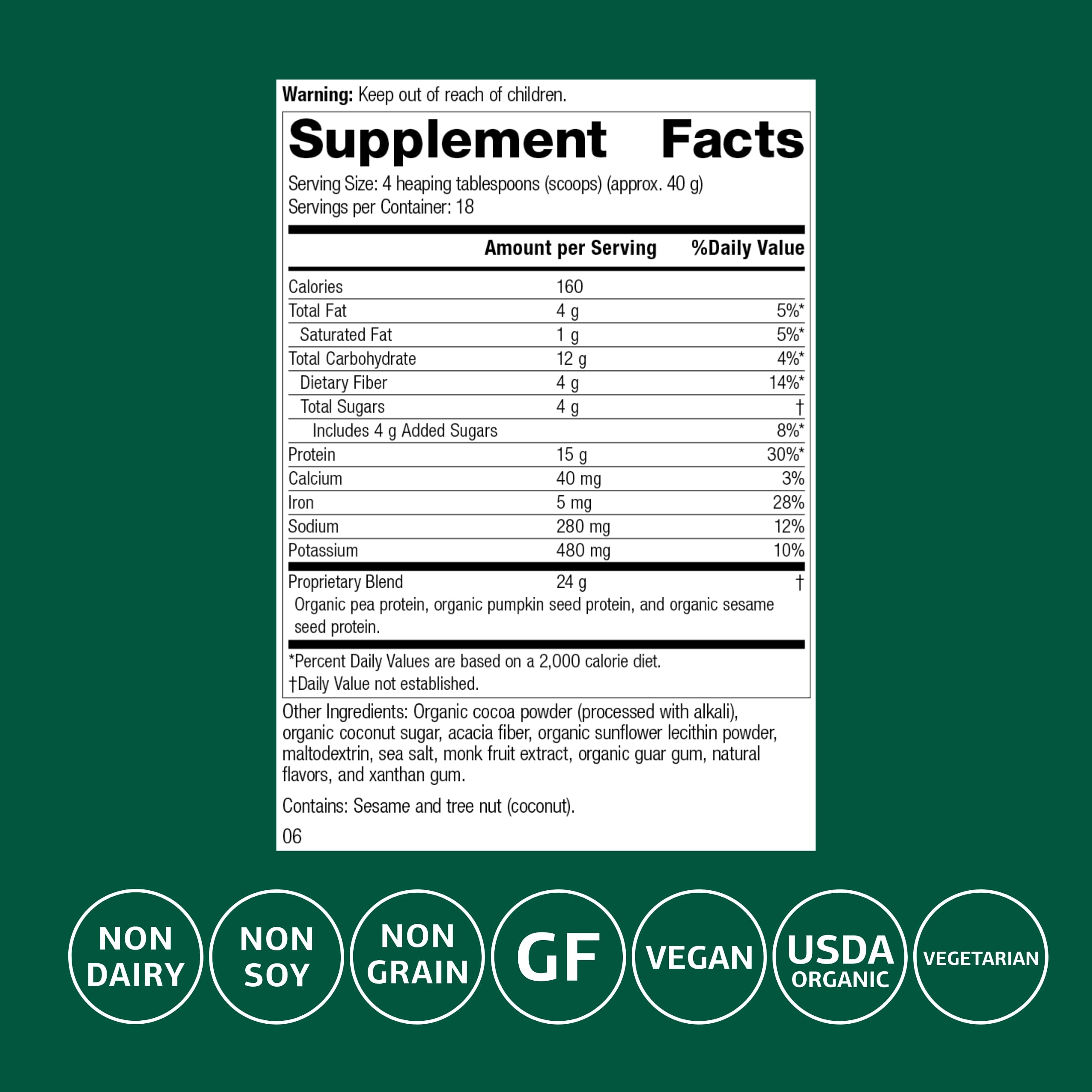 Standard Process Veg-E Complete Pro chocolate powder scoop closeup shows organic pea, pumpkin seed, and sesame proteins.