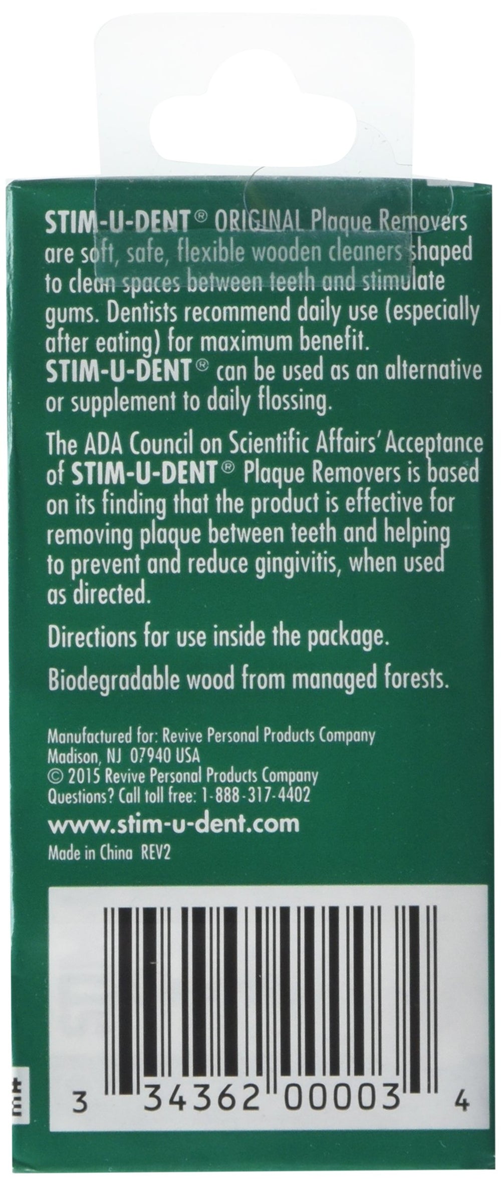 Close-up of Stim-U-Dent Mint Plaque Removers cleaning between teeth