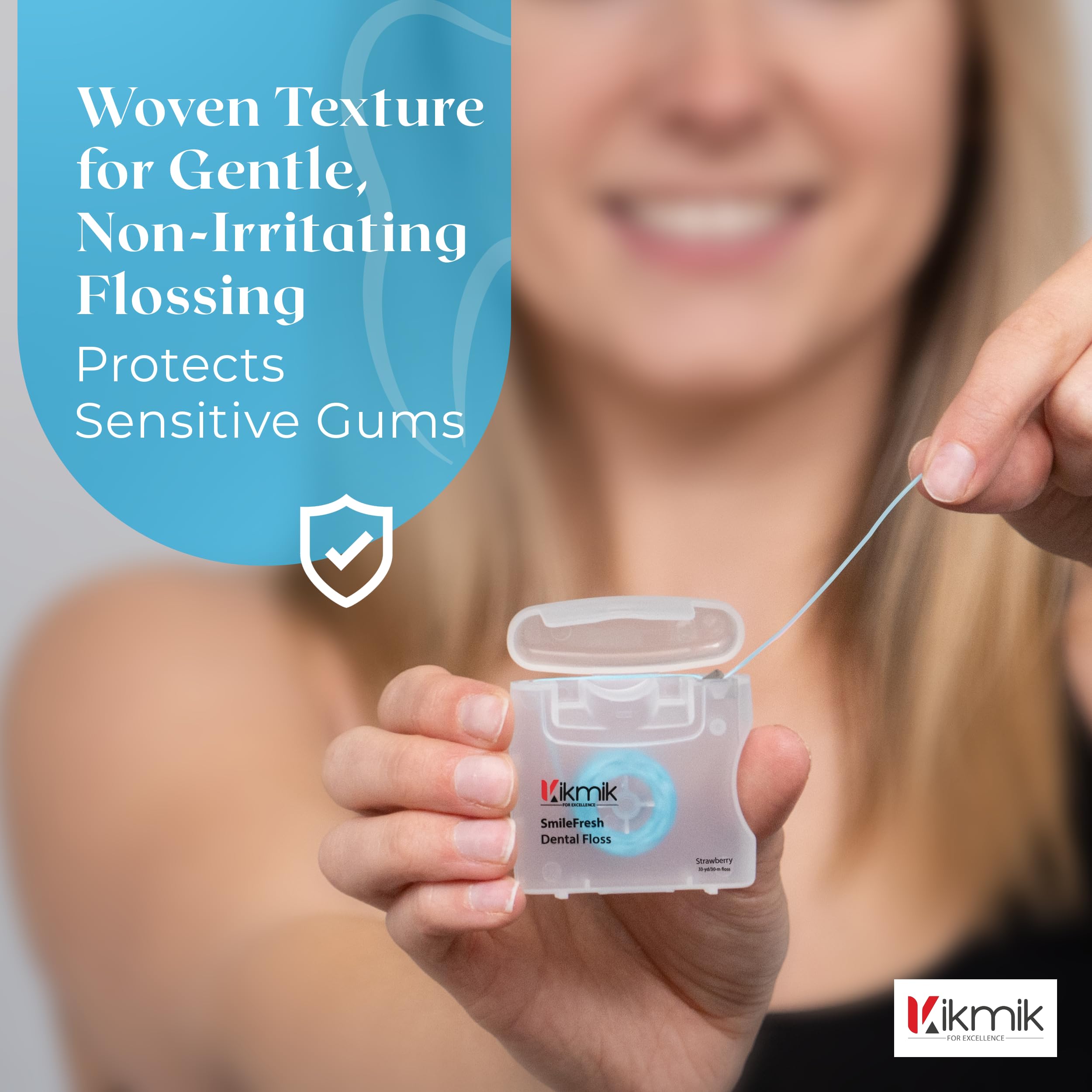 Close-up of strawberry-flavored woven dental floss