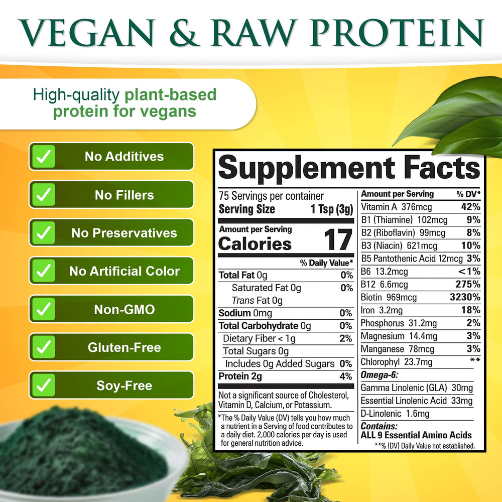 Spirulina powder being poured into a glass of smoothie