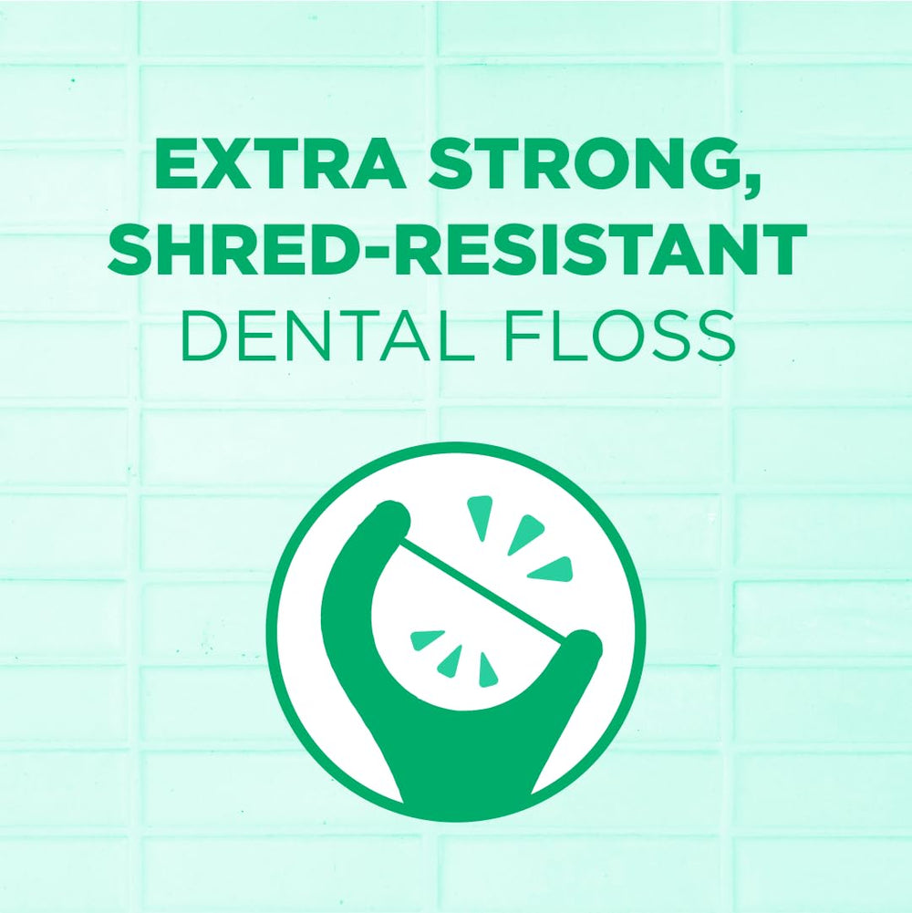 Dental floss picks arranged on white background