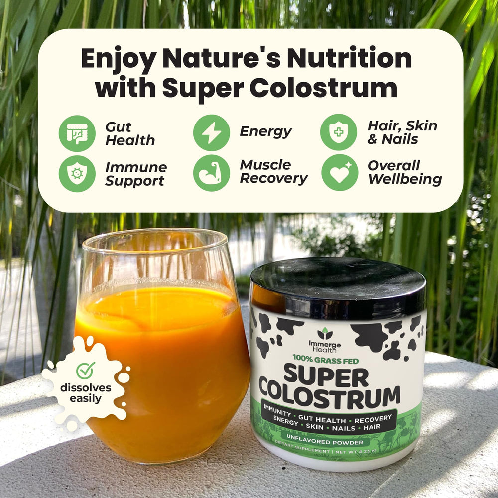 Unflavored colostrum powder close-up with measuring scoop