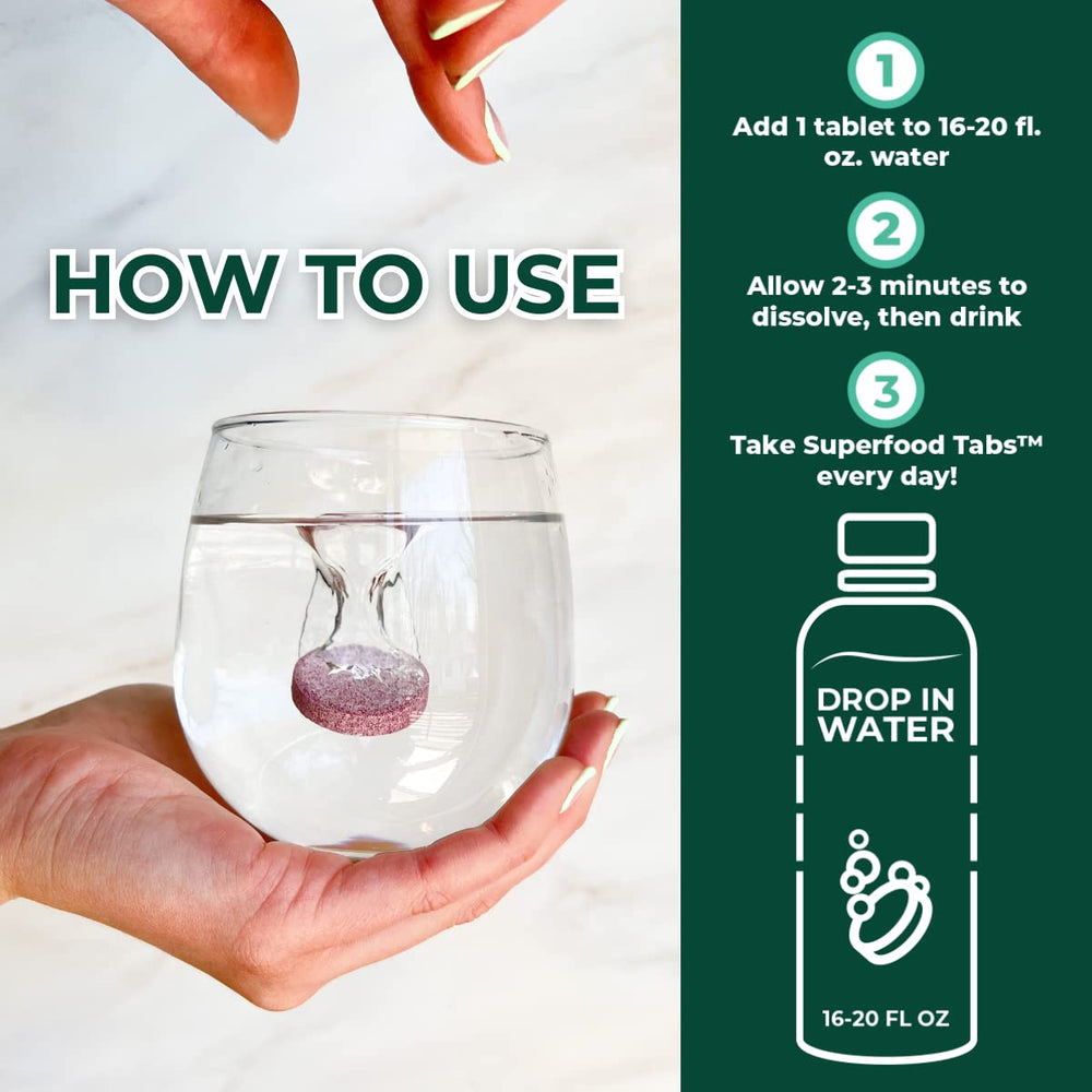 Superfood Tabs mixed-berry glass highlights a refreshing detox drink for digestion.