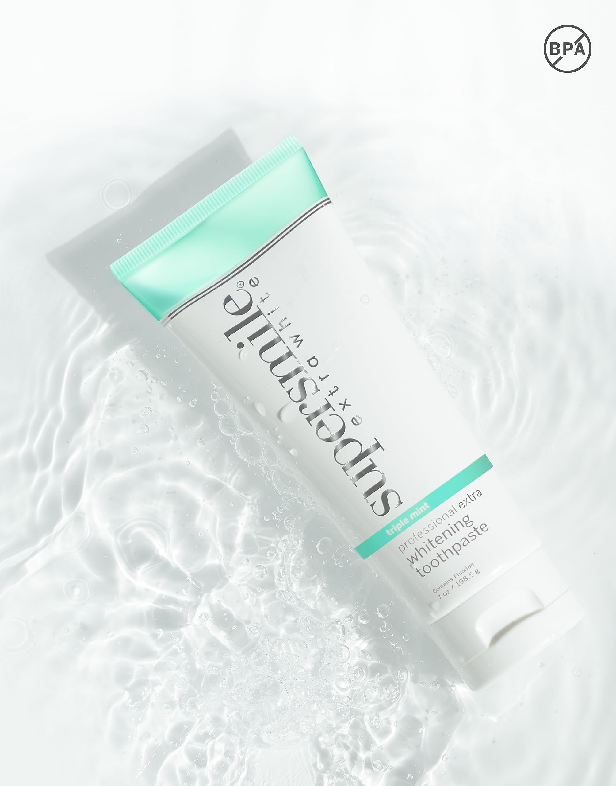 7 oz tube of Supersmile toothpaste on a clean white background