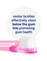 Toothbrush standing upright for hygienic drying with pink Supersmile