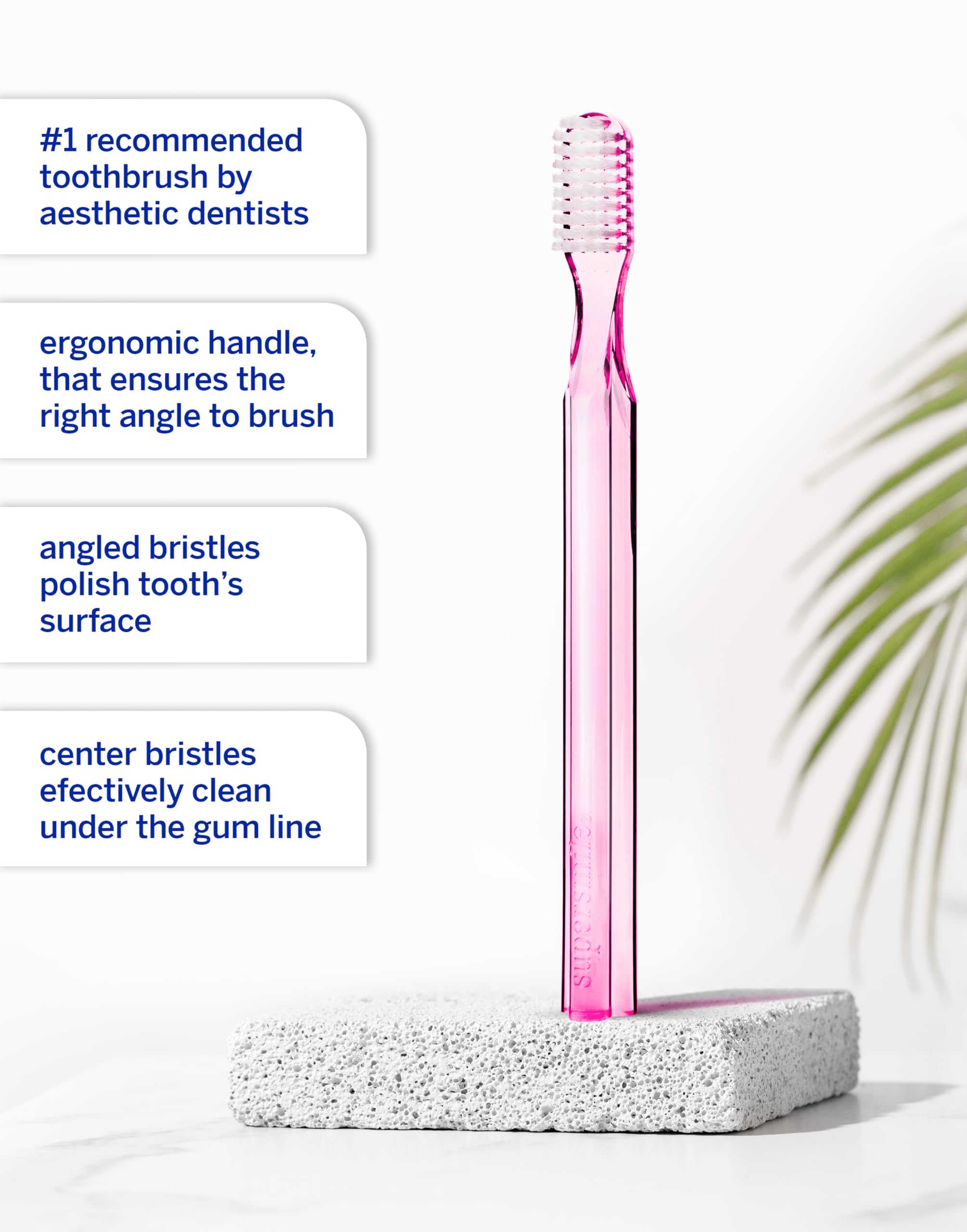 Ergonomic pink toothbrush in hand showing comfortable grip