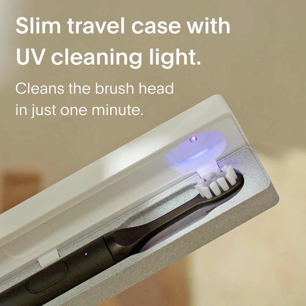 SURI 1.0 black electric toothbrush side view