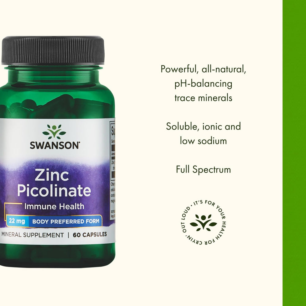 Mineral drops being added to water in a glass