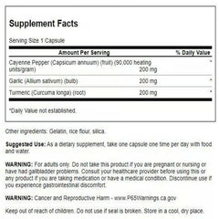 Three-pack display of Swanson turmeric garlic cayenne capsules