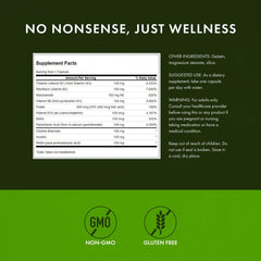 Swanson Vitamin B-100 capsules spilling from the bottle